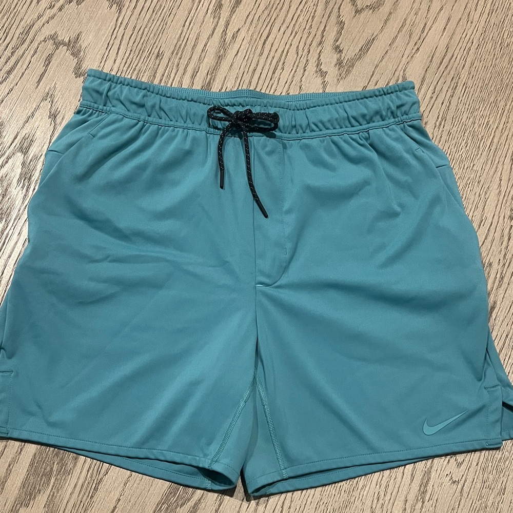 Nike Turquoise Sports Shorts with Black Drawstring